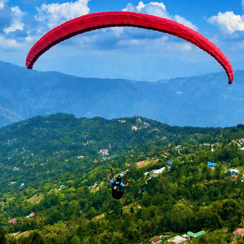 Tandem paragliding above the green hills of South Sikkim