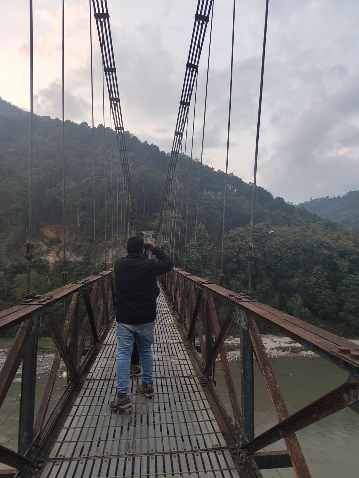 Suspension bridge above a river valley in South Sikkim