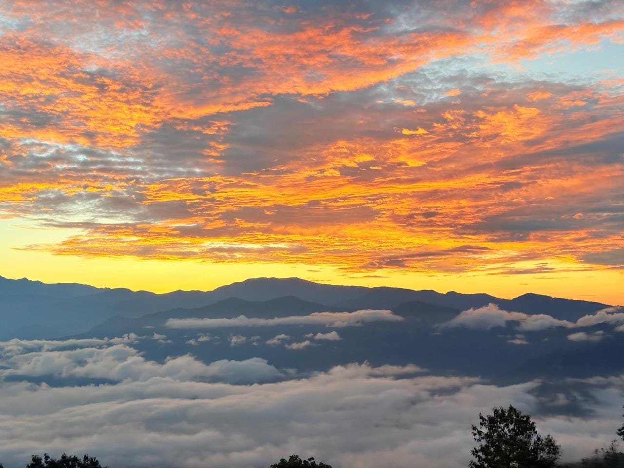Dramatic sunrise clouds and mountain layers viewed from Sadam Hills
