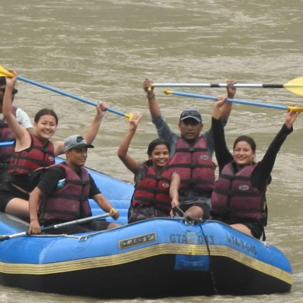 Rafters navigating rapids on the Rangit River near Melli, Sikkim